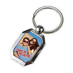 Elegancki ciężki, metalowy, brelok jednostronny. 2