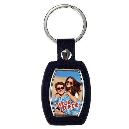 Elegancki ciężki, metalowy, brelok jednostronny ze skórką.